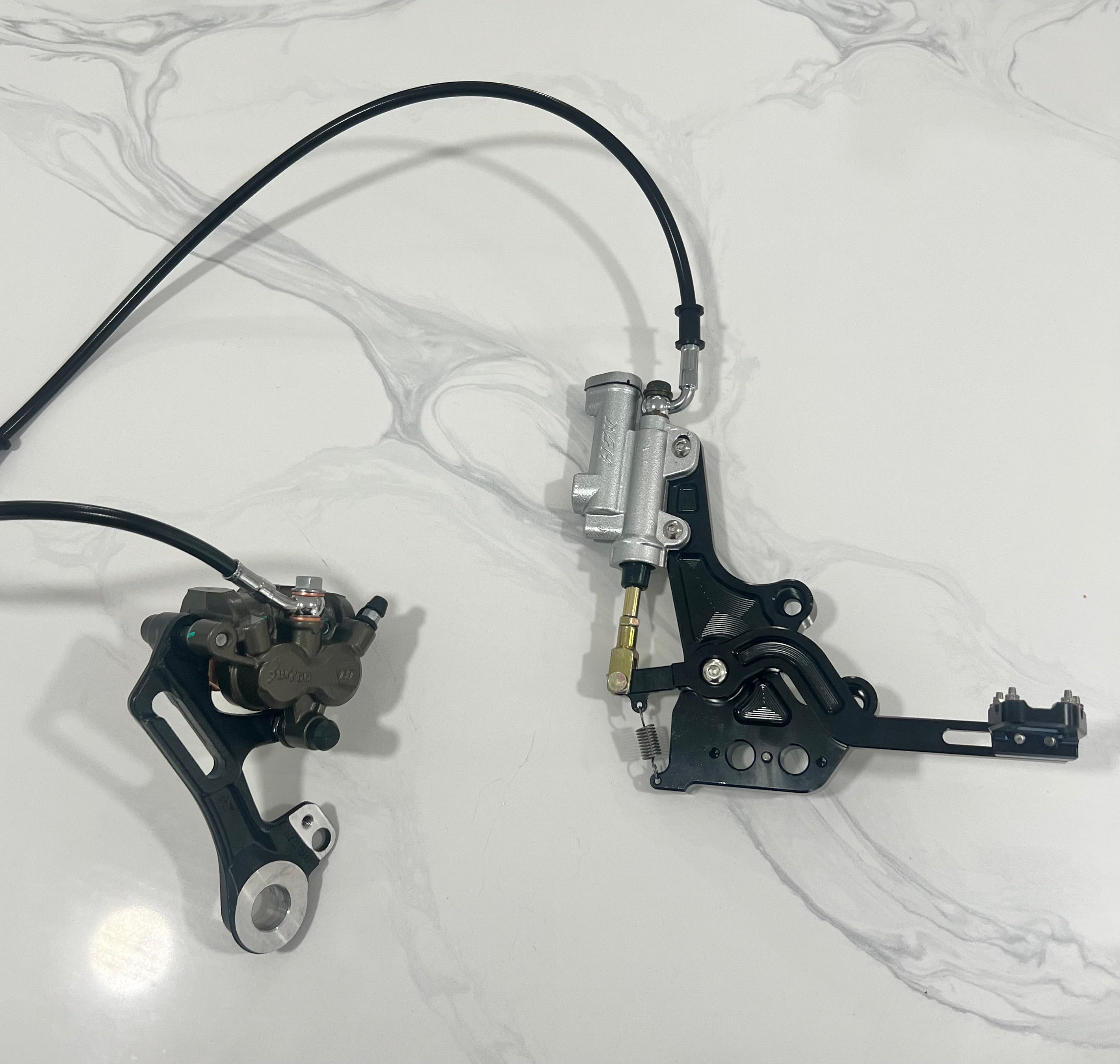 Surron lbx/lbs foot brake with ultra bee caliper