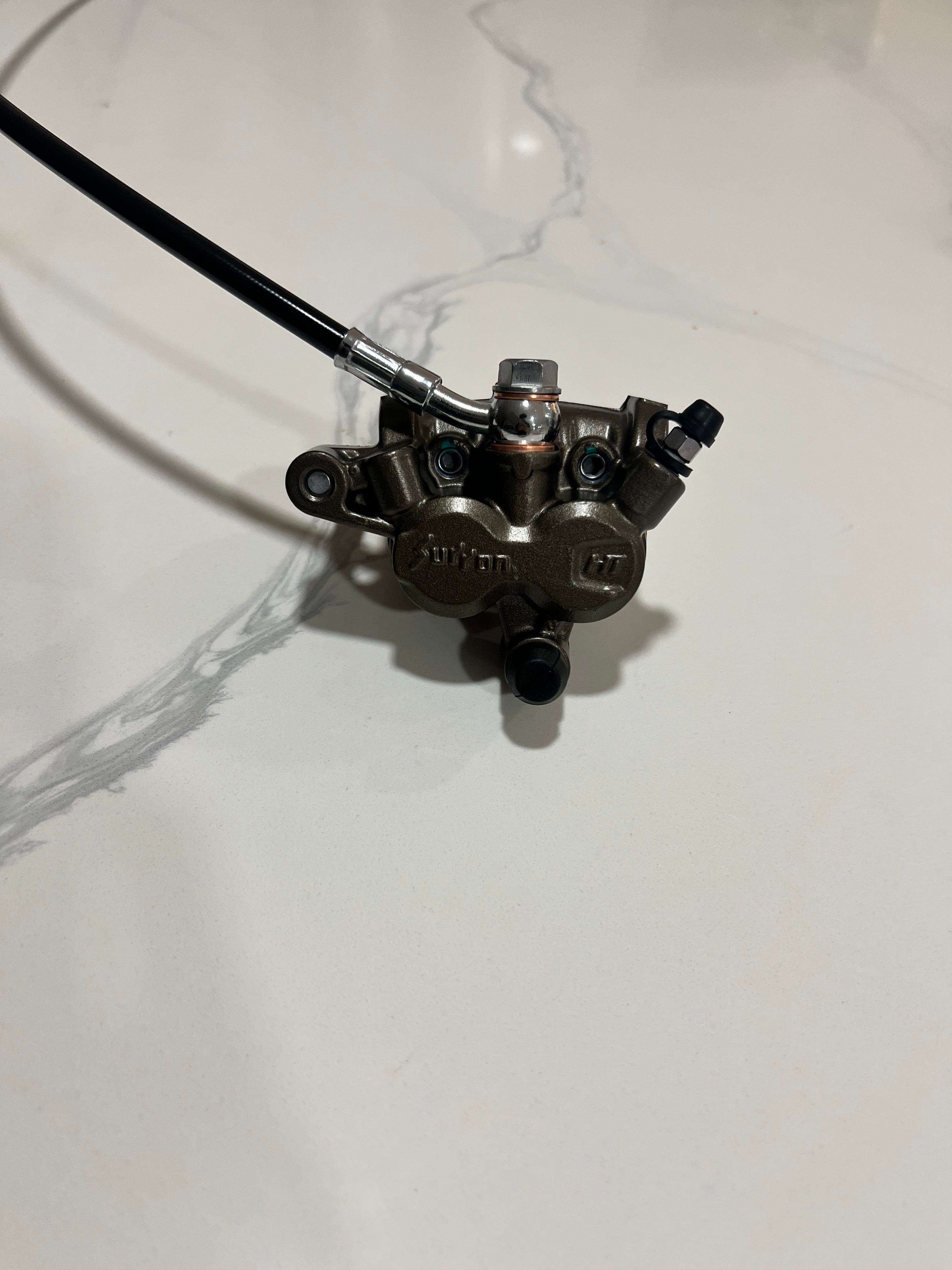 Oem surron ultra bee caliper